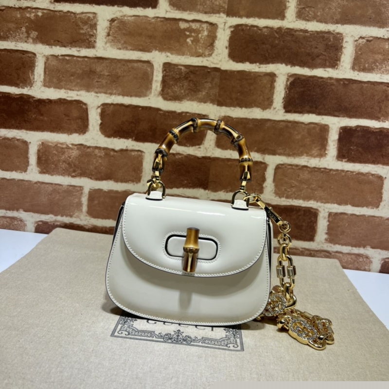 G*u*i top handle bags